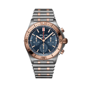 Breitling Chronomat B01 42 cassa acciaio e oro rosso con quadrante blu e lunetta caratteristica con cavalieri.